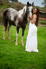 Female model with a horse