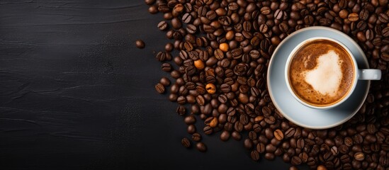 Black coffee with milk foam in white cup coffee beans in burlap bag on dark table