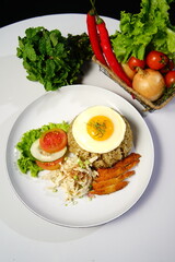 fried eggs with vegetables