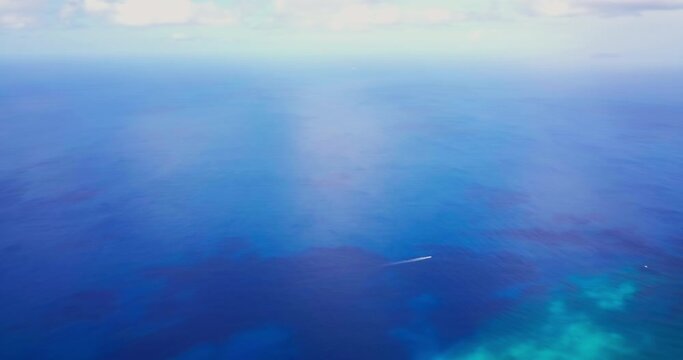 Ocean & Boat 4K Aerial, Pan right to left, French Caribbeans, Guadeloupe France