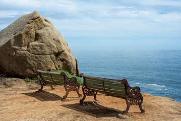 two wooden bench in Concon, Valparaiso, Chile