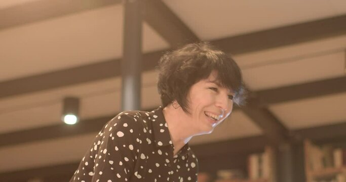 beloved woman speaks teacher Effective verbal communication skills development background. Portrait female business coach actively delivering information during sales enhancement workshop. 