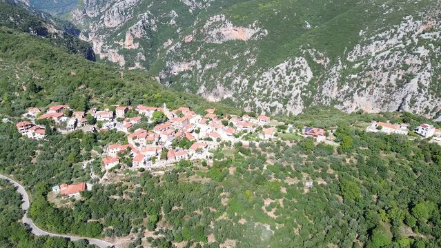 Aerial view over the old traditional stoned buildings and houses in Vorio village located near Kentro Avia and Pigadia Villages in Mani area, Taygetus Mount, Messenia, Greece