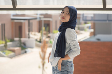 Asian Muslim Woman Posing Outdoors