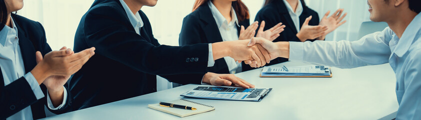 Business people group handshake at meeting table. Job interview success or making successful business oratory agreement - obrazy, fototapety, plakaty