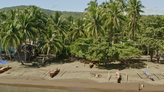 Smooth dolly view along the beach of Bacuag, a  popular tourist beach in Surigao Del Norte Philippines.