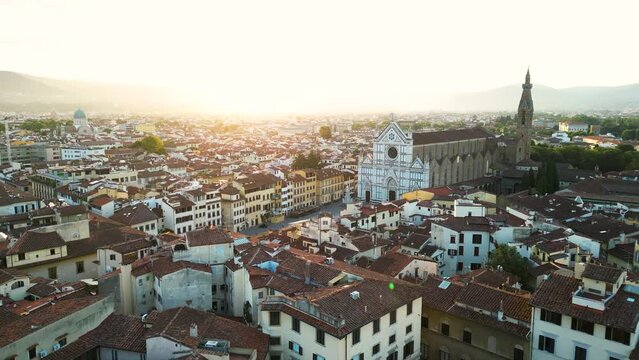 Aerial view of Basilica of Santa Croce in Florence and Piazza di Santa Croce at sunset, Tuscany, Italy