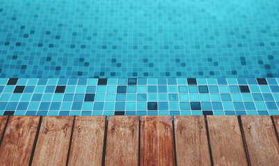 Wooden plank floor on poolside villa. Hotel and resort accommodation. Swimming pool background.