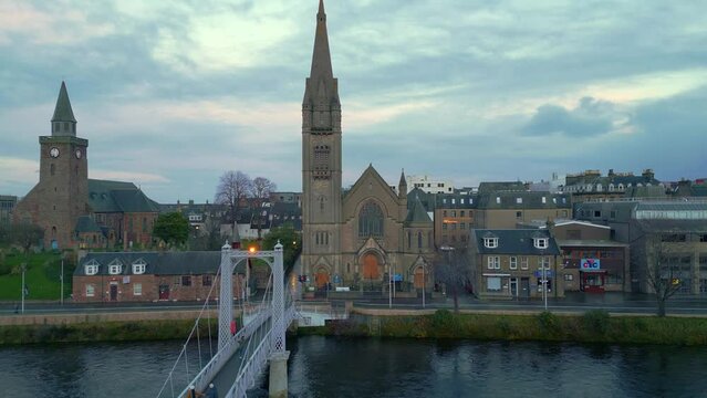 Ascending above the suspension bridge over river Ness towards Old high church