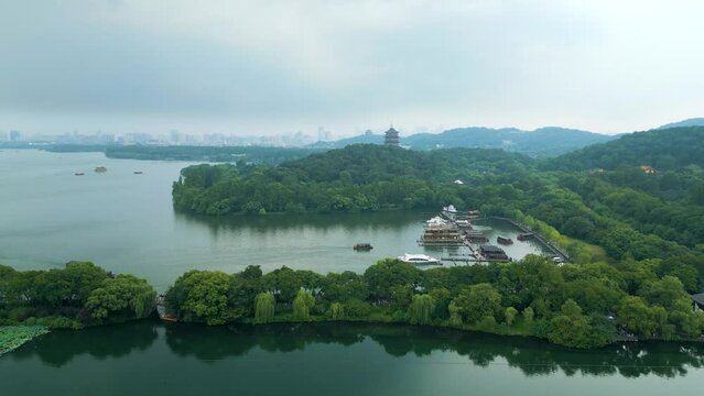 Revealing Drone View of Hangzhou&rsquo;s West Lake, Pagoda, and Cityscape