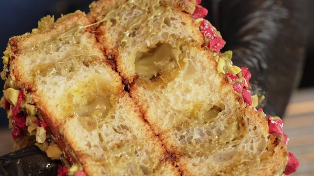 Pistachio croissant pastry opening London bakery top view