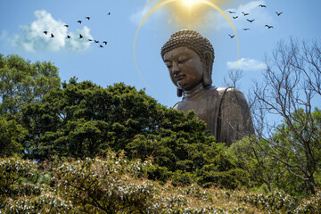 The Tian Tan Buddha in Hong Kong, surrounded by many flying birds, with a golden halo of light above the statue
