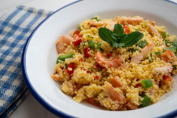 Couscous salad with vegetables and prawns