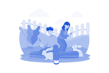 Couple Feeding Little Rabbit