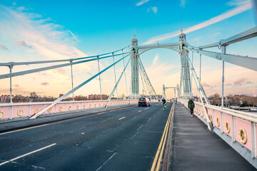 Albert Bridge is a road bridge over the River Thames connecting Chelsea in Central London on the...