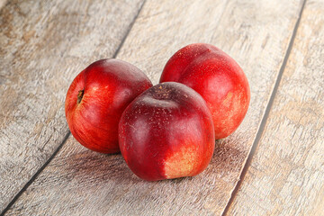 Ripe sweet juicy nectarines heap