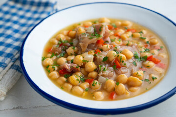 Stewed chickpeas with pig's feet. Traditional recipe from northern Spain.