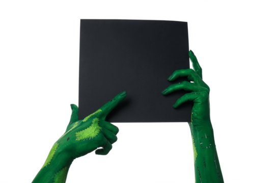 PNG, zombie hands holding a sheet of black paper, isolated on white background.