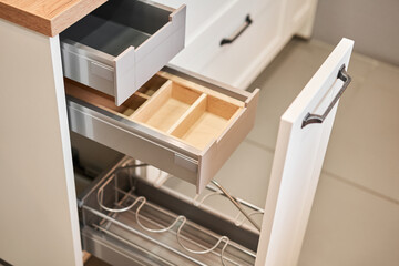 Empty storage box. Open drawer for different utensils and storage. Kitchen utensil cutlery drawer...