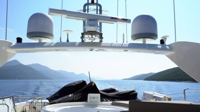 Scenic view on yacht in Mljet national park, Croatia on sunny day. Panning shot