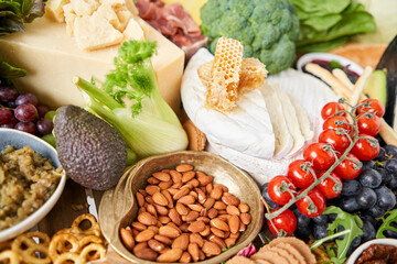 Table full of mediterranean appetizers, tapas or antipasto. Assorted Italian food set. Delicious snack on party or picnic time. Meat and cheese. Italian style banquet. 