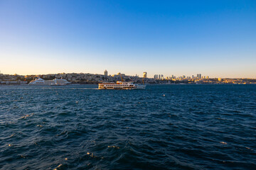 Istanbul view at sunset with a ferry