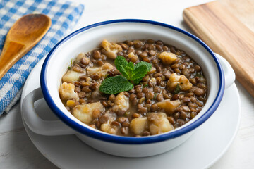 Stewed lentils with cabbage and seasonal vegetables.
