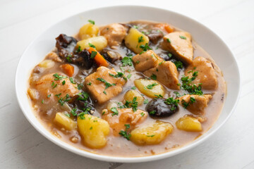 Turkey stew with potatoes and prunes. - obrazy, fototapety, plakaty