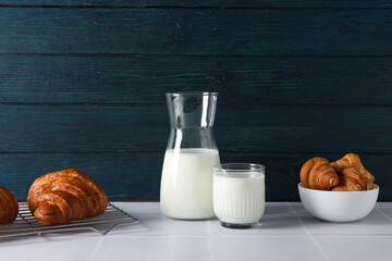 Breakfast tasty food concept - milk with bakery products