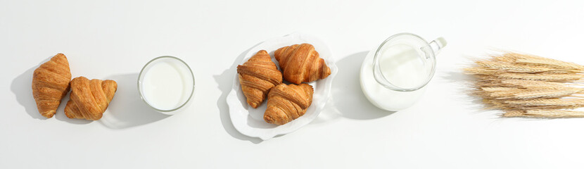 Breakfast tasty food concept - milk with bakery products