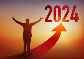 Carte de vœux 2024 montrant un homme d’affaires ouvrant les bras devant une flèche rouge en direction d’un horizon ensoleillé, symbole d’espoir et de réussite. - obrazy, fototapety, plakaty