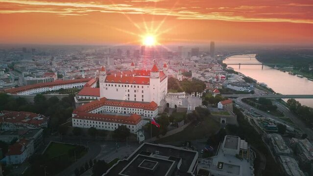 Bratislaca slovakia skyline aerialview drone footage of city bratislava castleat sunrise colored sky.