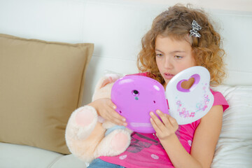 Young girl with electronic book