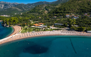  Aerial view of Sveti Stefan beach, Budva, Montenegro from drone. 