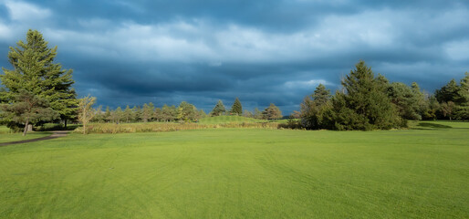 Nice hole on a Canadian golf club in Quebec, on the countryside
america, background, ball, beautiful, canada, environment, forest, golf, golf club, golf course, grass, green, hill, landscape, mountain
