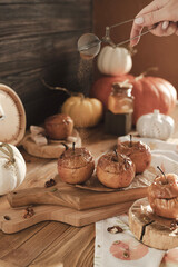 Baked apples with honey and nuts are on the dessert table