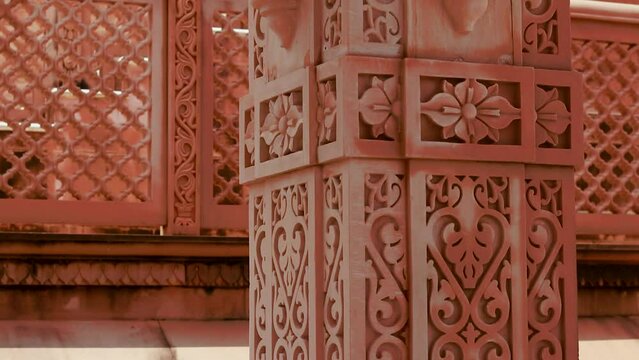 artistic hand carved red stone jain temple at morning from unique angle video is taken at Shri Digamber Jain Gyanoday Tirth Kshetra, Nareli Jain Mandir, Ajmer, Rajasthan, India.