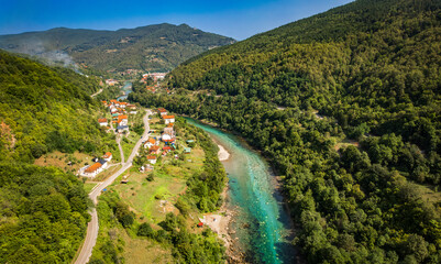 Aerial drone view of valley of the Drina river in Bosnia and Herzegovina in sunny weather.  - Powered by Adobe