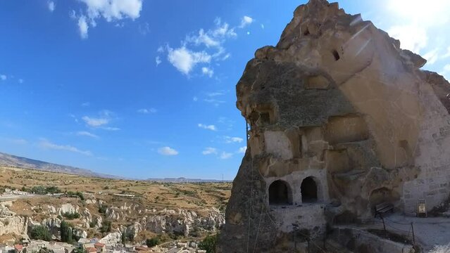 Ortahisar Castle, a historic fortress in Cappadocia, Turkey. Architectural marvel, marked by stone walls and intricate chambers, offers a captivating glimpse into centuries of history.