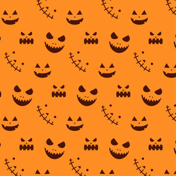 Seamless pattern with scary dark faces on orange background for halloween, packaging, wrapping, wallpapers, fabrics, textile, webs, apps