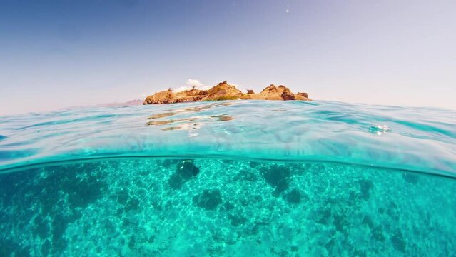 Duck dive freediving. Woman doing duck dive and freedive in the sea