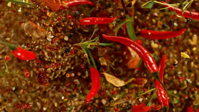 Super Slow Motion Shot of Flying Mix Spices. Isolated on Black Background. Filmed on high speed cinema camera, 1000fps.