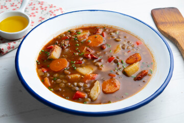 Spicy lentil stew with potatoes and carrots.