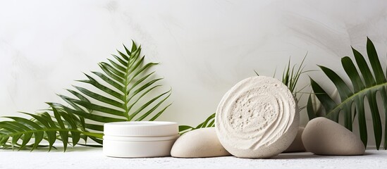 Natural skincare products like creams lotions serums and balms showcased on a white stone background with clay geometric embellishments and fern leaves promoting an eco friendly approach to 