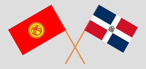 Crossed flags of Kyrgyzstan and Dominican Republic. Official colors. Correct proportion