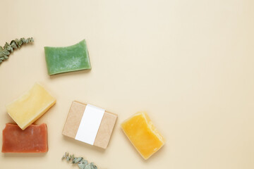 Natural eco-friendly soaps with different additives and soap in a mock up package