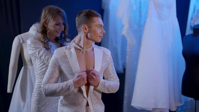 joyful homosexual men preparing to drag fashion show, lgbt community, diversity and tolerance, two gay in fashion atelier, designer and model