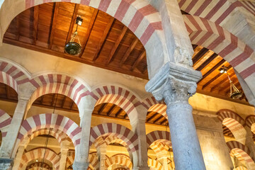 Hypostyle Hall in the Mosque-Cathedral of Cordoba. The site has a rich religious history and is currently an active cathedral