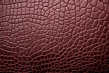 Detailed observation of intricate patterns in a macro closeup reveals the faux leather's synthetic texture and replicated imitation grain.
