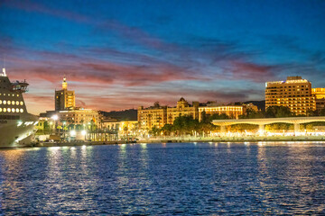 Malaga sunset skyline form the city port